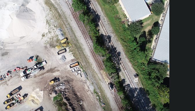 Aerial mapping capture of an aggregate yard with equipment and stockpiles