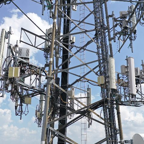 Close-range aerial photograph of antennas mounted on a telecommunications tower