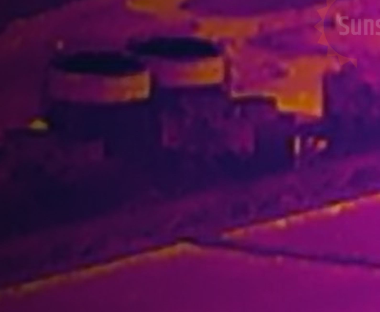 Radiometric thermal image of an industrial facility at night